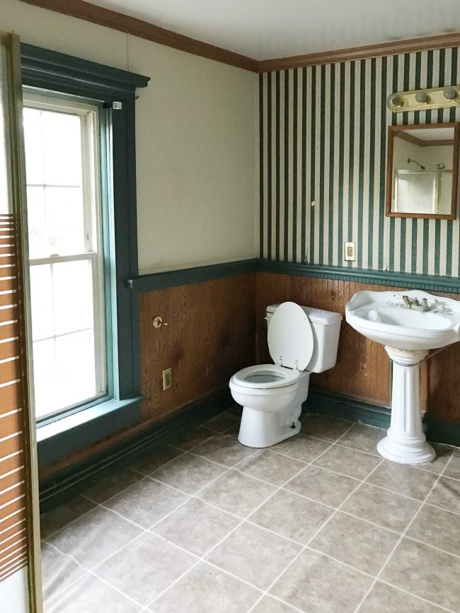 Before phot of bathroom in historic duplex in Cape Charles Virginia