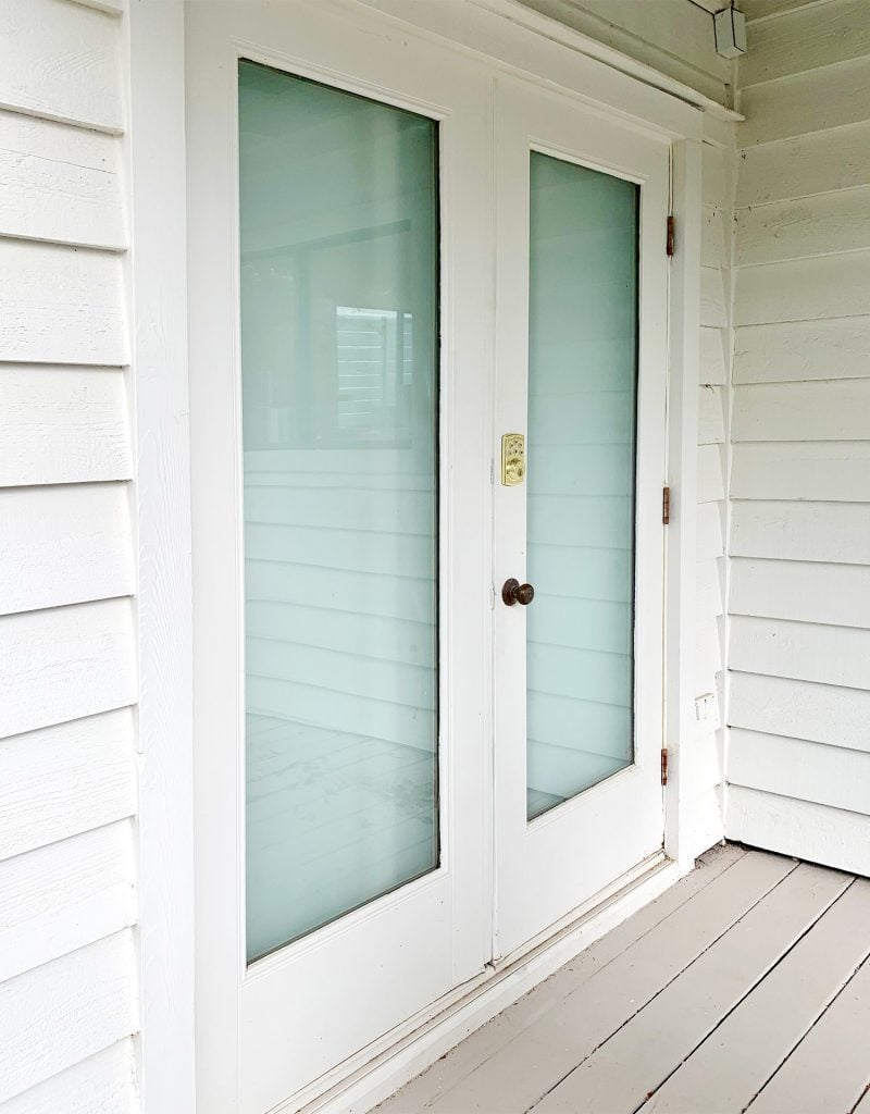 French doors viewed from outside that have been drywalled over