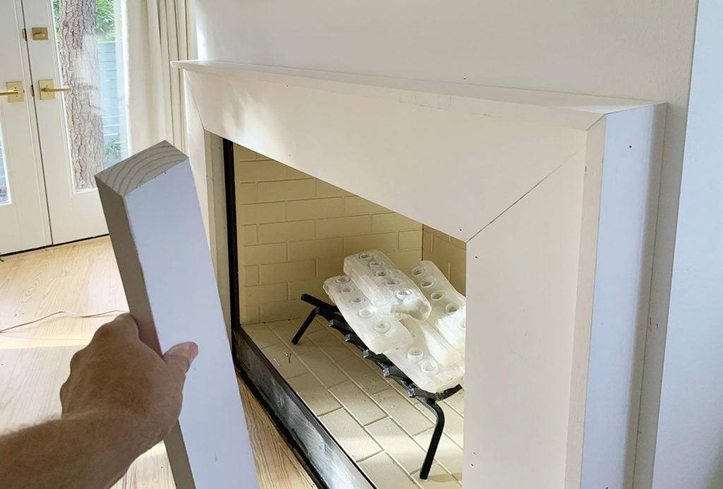 Side View Of Outside Trim Pieces Added Around Mantel Using Angled Miter Cuts