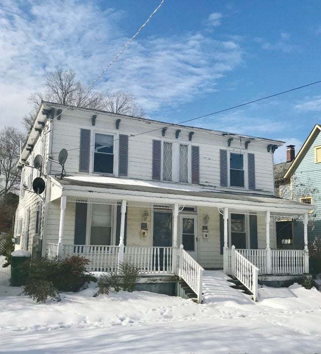 Before photo of historic home in Cape Charles Virginia in snow