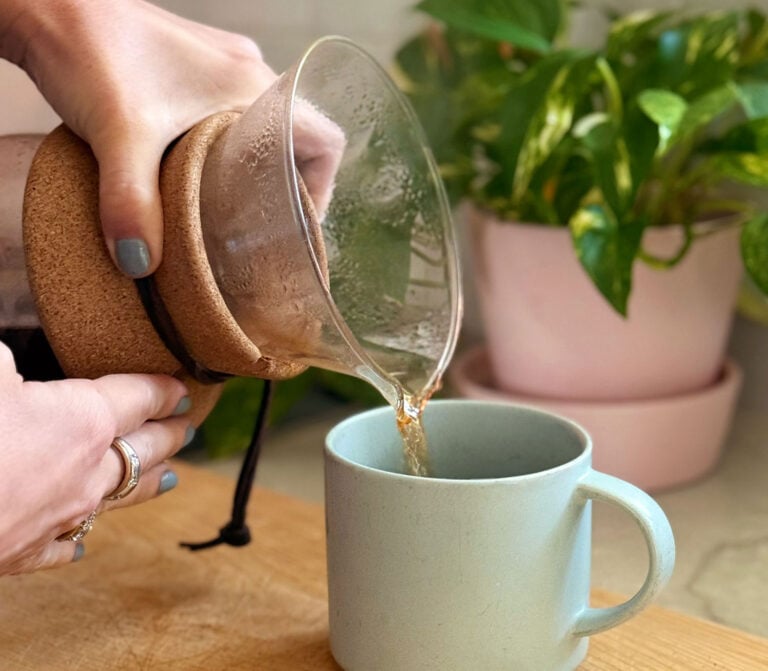 Pouring Pour Over Coffee Into Mug From Boden Maker