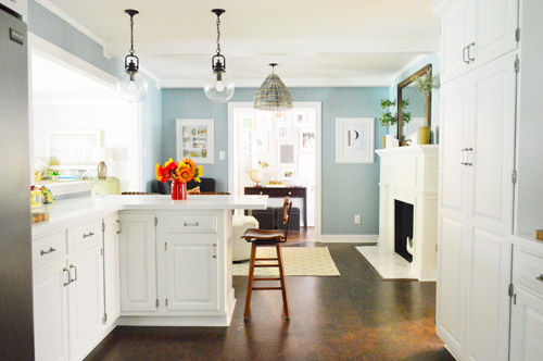 After Photo Of Kitchen Looking Towards Peninsula And White Fireplace