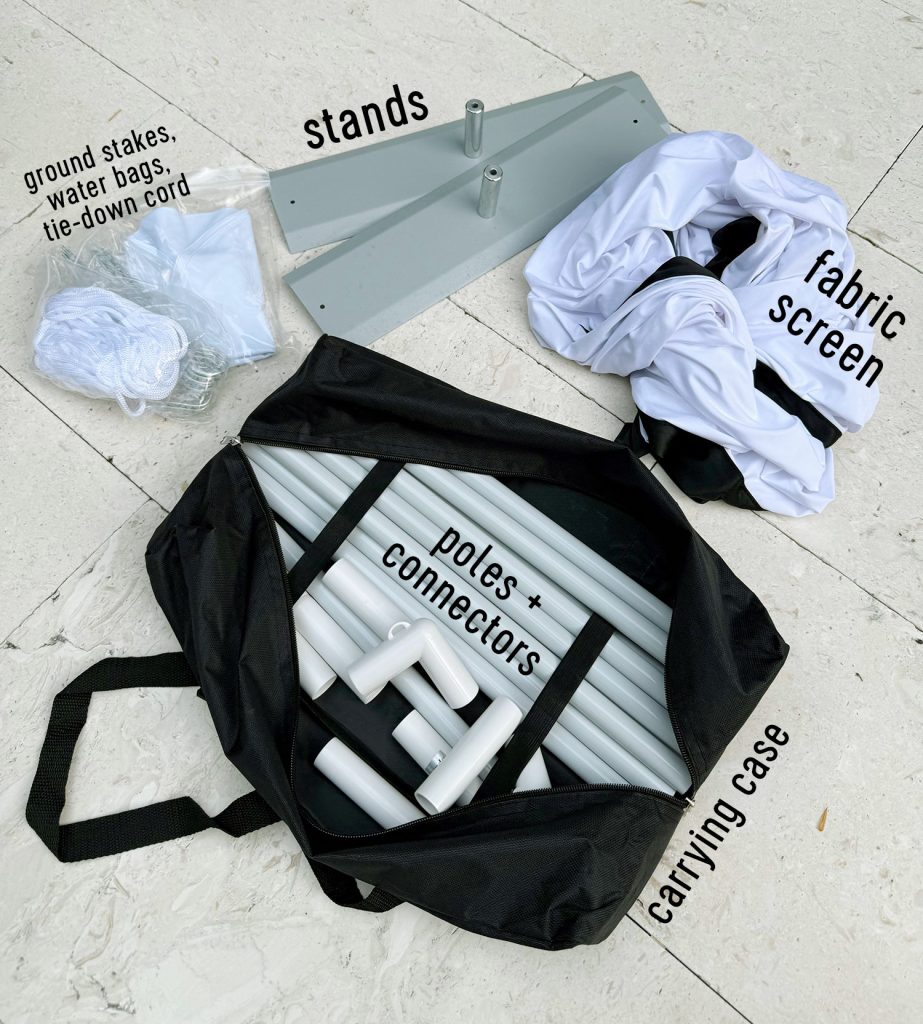 Supplies included in collapsible outdoor movie screen kid included stands weights rope and more