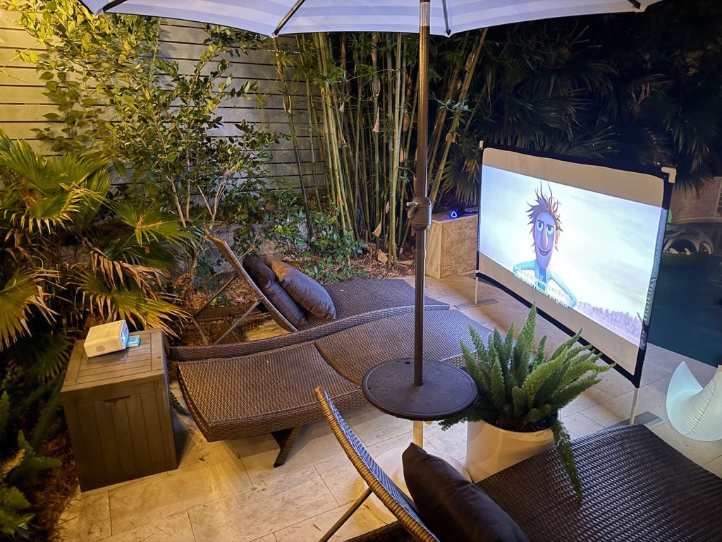 Projector Set Up Behind Outdoor Movie Screen