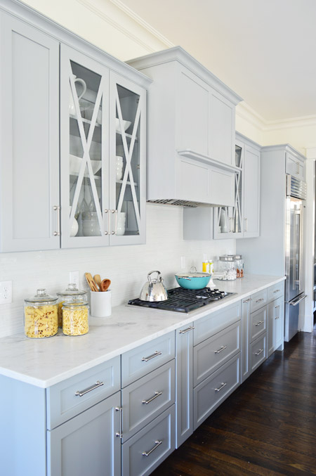 Gray Kitchen Cabinets With Glass X Inserts Painted Timberwolf Gray