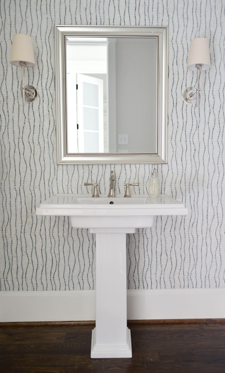 Pedestal Sink In Bathroom With Floor To Ceiling Decorative Marble Modern Tile
