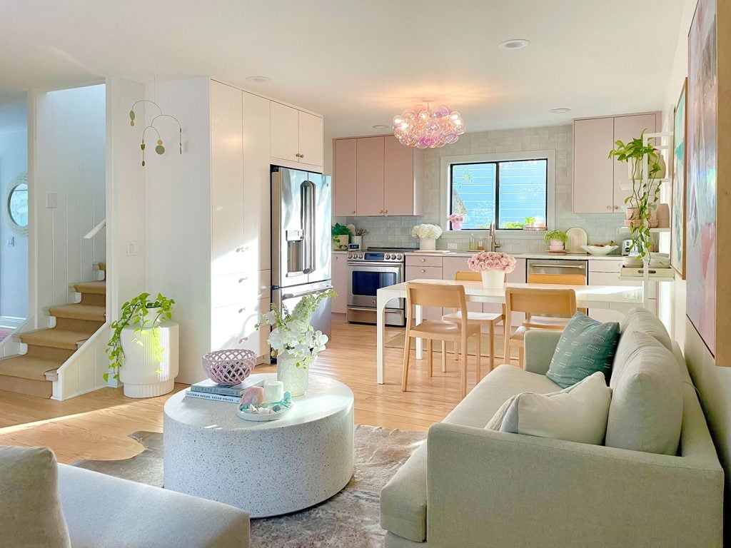 Small Ikea Kitchen With Mauve Cabinets And Glass Bubble Light Fixture