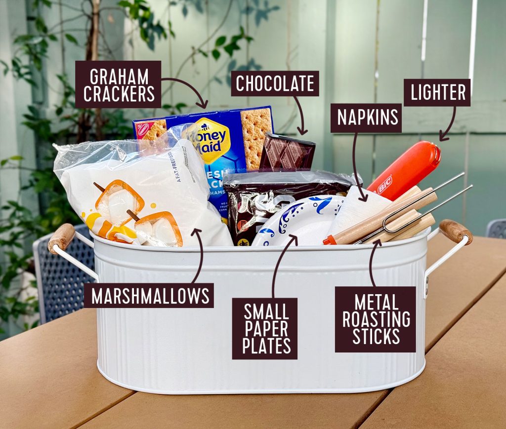 Smores Supply Kit In Metal Tin With Ingredients Lighter Plates Napkins And Metal Roasting Sticks