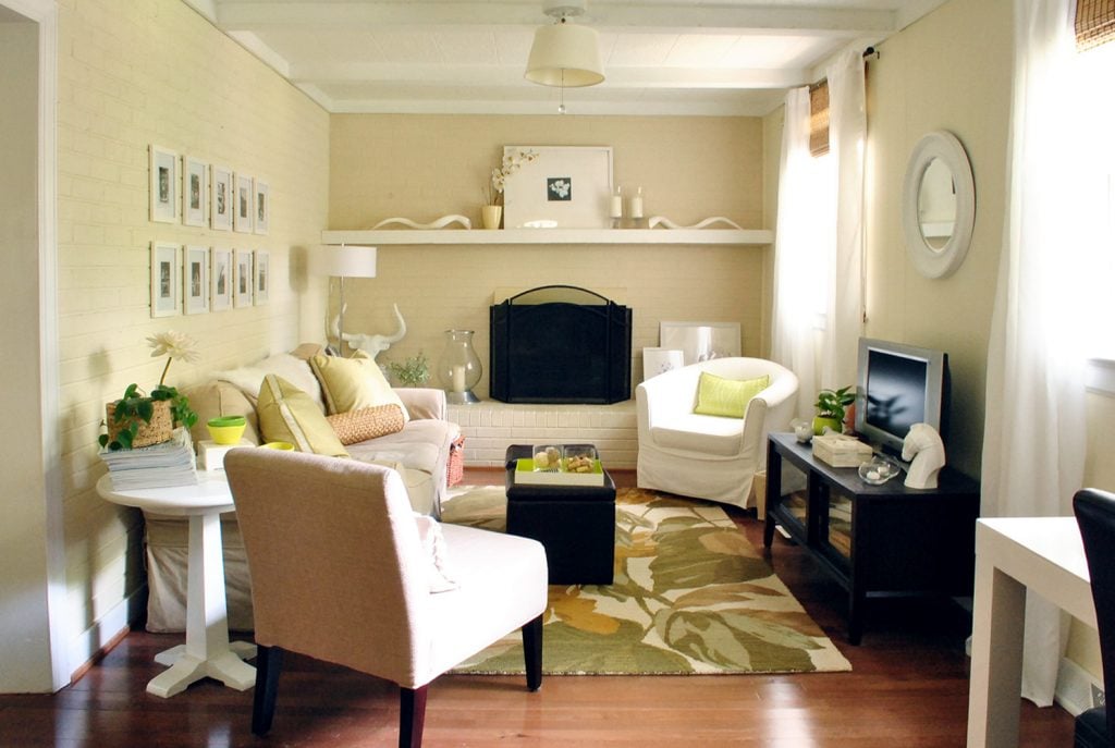 Cozy Living Room With Cream Walls And A Fireplace